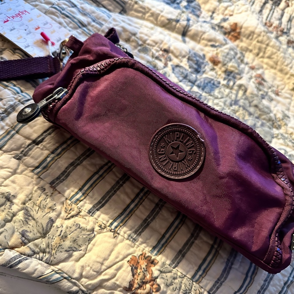 Kipling purple wristlet